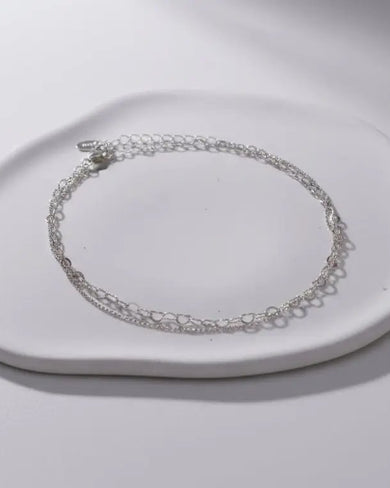 Arcus - Chaines de cheville Signé Flore