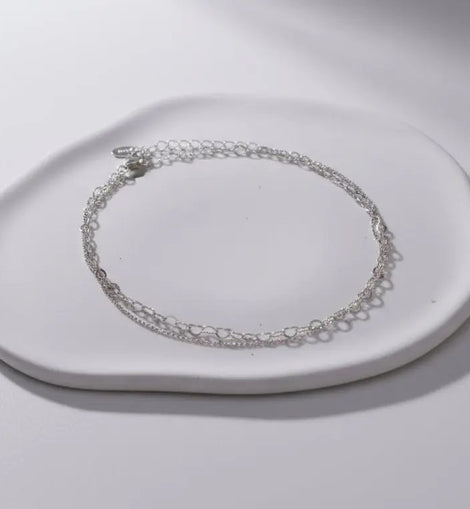 Arcus - Chaines de cheville Signé Flore