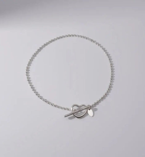 Munidicors – Chaines de Cheville Élégantes Signé Flore